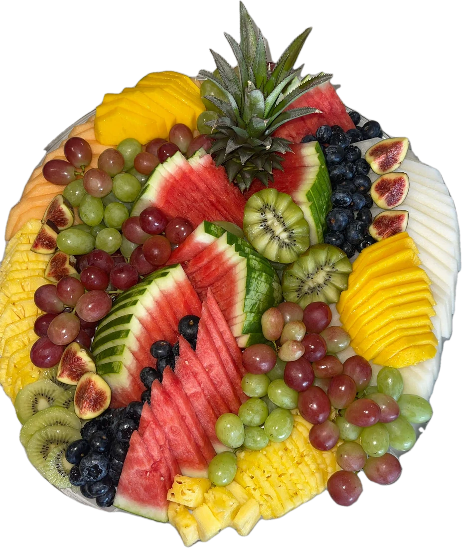 Large round fruit platter with watermelon, grapes and kiwi